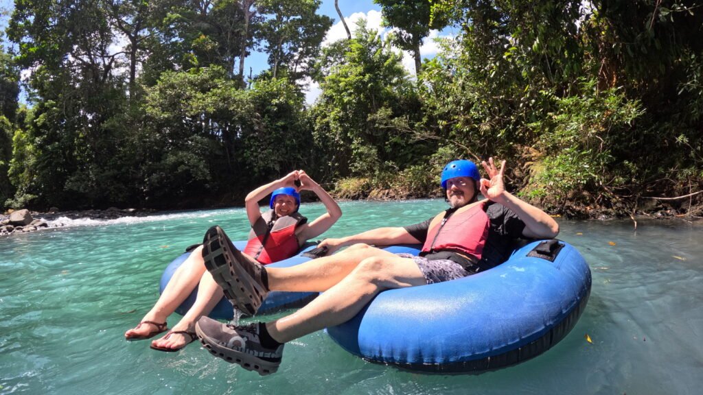Tourist in private Tubing Rio Celeste From La Fortuna