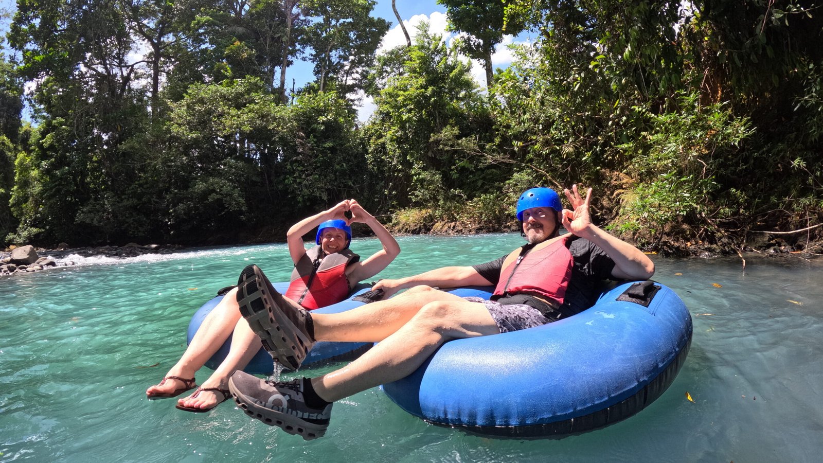 Tourist in private Tubing Rio Celeste From La Fortuna
